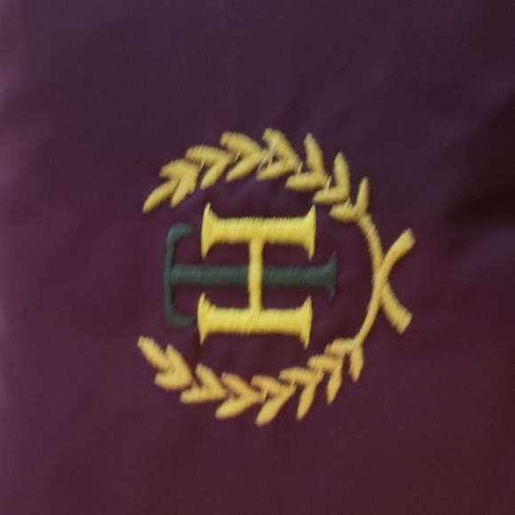 Tommy Hilfiger puffer vest in a size M.  It is a deep purple in color.   EUC - Picture 6 of 7